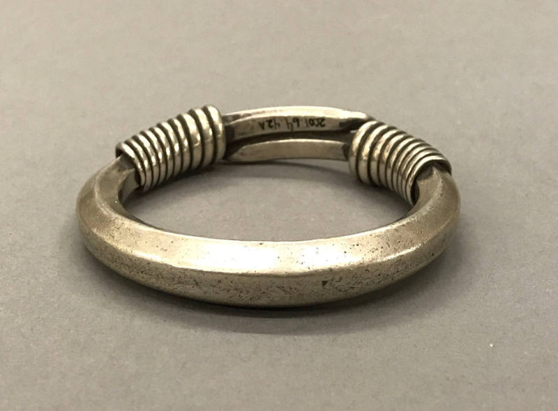 Bracelet, 20th Century
Miao culture; probably Guizhou Province, China
Silver; 1/2 x 2 7/8 in.…