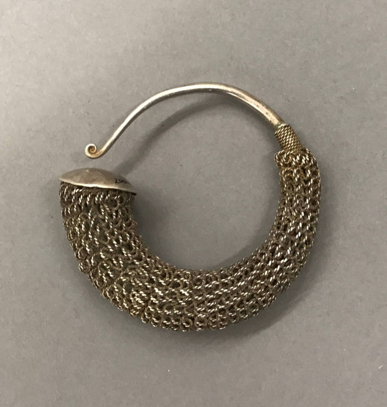 Earring, 20th Century
probably Miao culture; probably Guizhou Province, China
Silver; 2 7/8 x…