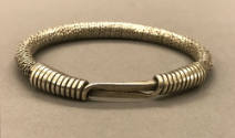 Twisted Wire Bracelet, 20th Century
Miao culture; Guizhou Province, China
Silver; 3 1/4 in.
…