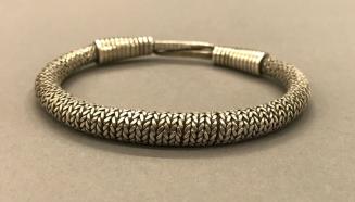 Twisted Wire Bracelet, 20th Century
Miao culture; Guizhou Province, China
Silver; 3 1/4 in.
…