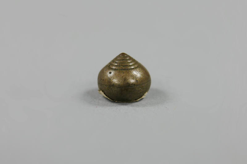 Weight, 20th Century
Laos
Bronze; 1/2 × 5/8 × 5/8 in.
2019.23.65
Gift of Anne and Long Shun…