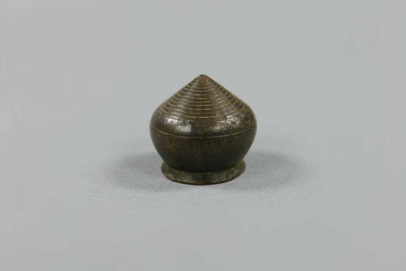 Weight, 20th Century
Laos
Bronze; 7/8 × 7/8 × 7/8 in.
2019.23.67
Gift of Anne and Long Shun…