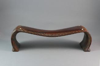Headrest (Kali Hahapo), 20th Century
Tonga, Polynesia
Wood and mother-of-pearl; 4 × 15 × 4 in…