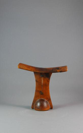 Headrest, 20th Century
Pokot or Turkana culture; Kenya
Wood and metal; 7 1/4 × 6 1/4 × 3 in.
…