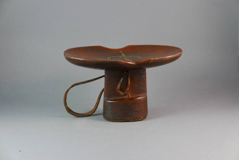 Headrest, 20th Century
Karamojong culture; Uganda
Wood, metal and leather; 5 3/4 × 9 1/2 × 5 …