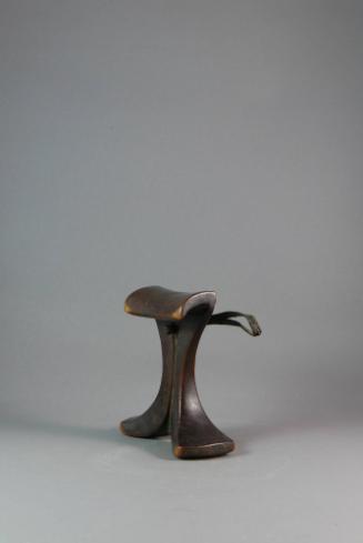 Headrest, 20th Century
Karamojong culture; Uganda
Wood and leather; 6 × 5 1/2 × 2 1/2 in.
20…