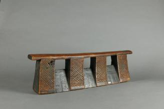 Headrest, 20th Century
Zulu culture; South Africa
Wood; 7 × 24 1/4 × 4 in.
2019.22.13
Anony…