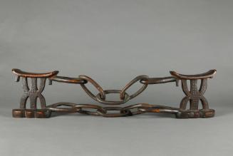 Headrest, 20th Century
Tsonga culture; South Africa or Zimbabwe
Wood; 6 7/8 × 32 × 2 1/2 in.
…