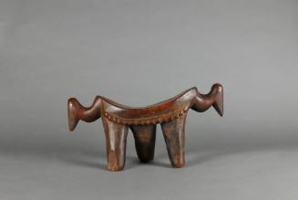 Headrest, 20th Century
Dinka culture; South Sudan
Wood and metal; 8 7/8 × 16 3/4 × 4 1/4 in.
…