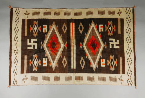 Rug, c. 1910
Navajo culture; New Mexico
Wool and pigment; 48 × 68 1/2 in.
2019.21.1
Gift of…