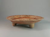 Plate, 250-550 CE
Maya culture; Guatemala
Ceramic and pigment; 2 7/8 × 11 3/4 in.
78.77.1
D…
