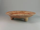 Plate, 250-550 CE
Maya culture; Guatemala
Ceramic and pigment; 2 7/8 × 11 3/4 in.
78.77.1
D…