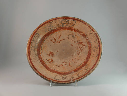 Plate, 250-550 CE
Maya culture; Guatemala
Ceramic and pigment; 2 7/8 × 11 3/4 in.
78.77.1
D…