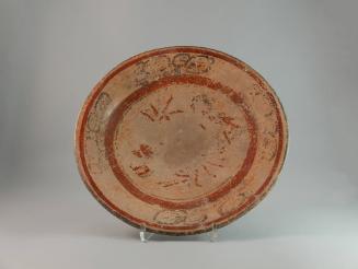 Plate, 250-550 CE
Maya culture; Guatemala
Ceramic and pigment; 2 7/8 × 11 3/4 in.
78.77.1
D…