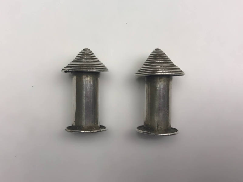 Ear Spools, 20th Century
Miao culture; probably Guizhou Province, China
Silver; 2 × 1 1/8 × 1…