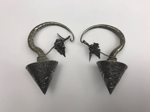 Earrings, 20th Century
Miao culture; probably Guizhou Province, China
Silver; 5 1/2 × 3 3/4 ×…