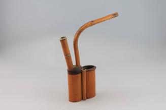 Water Pipe, 19th to 20th Century
China
Bamboo and metal; 8 7/8 × 6 3/4 × 1 3/8 in.
2020.8.35…