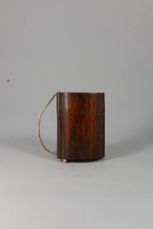 Tobacco Container, 20th Century
Miao culture; China
Wood and cotton; 4 3/16 × 3 1/8 × 1 13/16…