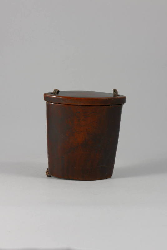 Tobacco Container, 20th Century
Miao culture; China
Wood and leather; 3 5/8 × 3 9/16 × 1 11/1…