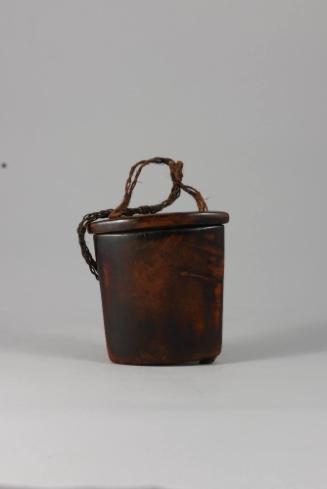 Tobacco Container, 20th Century
Miao culture; China
Wood and fiber; 3 11/16 × 3 1/2 × 1 3/8 i…