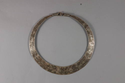 Neck Ring, 20th Century
Miao culture; probably Guizhou Province, China
Silver; 7 3/4 × 7 7/8 …