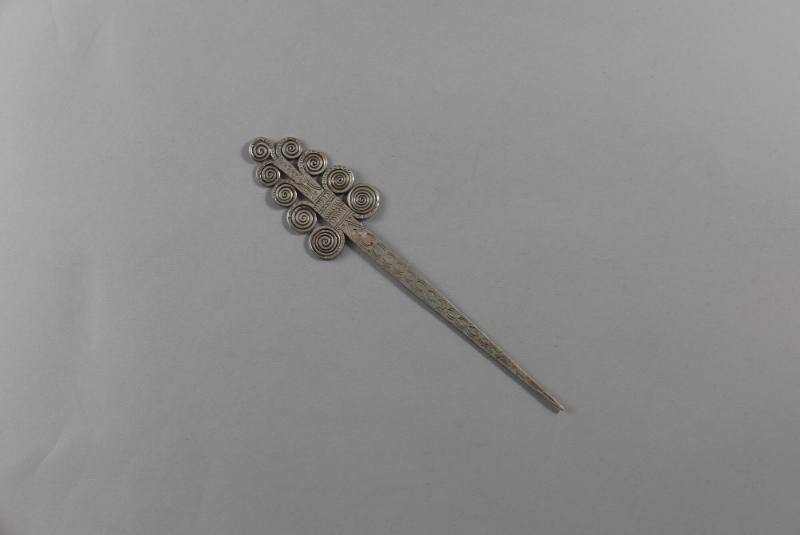 Hair Pin, 20th Century
Miao culture; probably Guizhou Province, China
Silver; 5 3/4 × 1 1/4 ×…