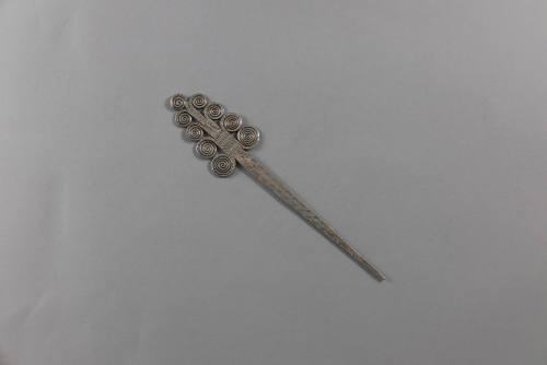 Hair Pin, 20th Century
Miao culture; probably Guizhou Province, China
Silver; 5 3/4 × 1 1/4 ×…