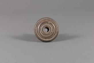 Ear Spool, 20th Century
Miao culture; probably Guizhou Province, China
Silver; 1 × 1 5/8 in.
…