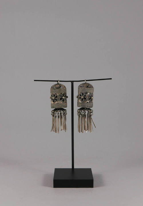 Earrings, 20th Century
Miao culture; probably Guizhou Province, China
Silver; 2 7/8 × 1 in.
…