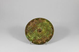 Mirror with “Grass-Leaf” Pattern
Western Han dynasty (206 BCE - 9 CE)
Bronze
Gift of Dr. Ste…