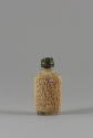 Snuff Bottle with 1,000 Faces of Buddha, Qing dynasty (1644-1911)
China 
Jade, metal and cork…