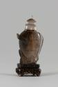 Snuff Bottle with Stopper, 20th Century
China
Quartz, cork and wood; 3 1/4 × 3/4 × 1 3/4 in.
…