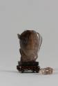 Snuff Bottle with Stopper, 20th Century
China
Quartz, cork and wood; 3 1/4 × 3/4 × 1 3/4 in.
…