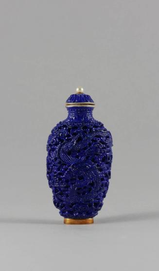 Blue Snuff Bottle with Molded Phoenix and Dragon Design, Qing dynasty (1644-1911)
China
Porce…