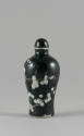 Snuff Bottle Decorated with Prunus Blossoms, Qing dynasty (1644-1911)
China
Porcelain and ena…