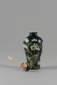 Snuff Bottle Decorated with Prunus Blossoms, Qing dynasty (1644-1911)
China
Porcelain and ena…