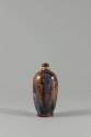 Snuff Bottle with “Flambé” Glaze, Qing dynasty (1644-1911)
China
Glazed porcelain and metal; …