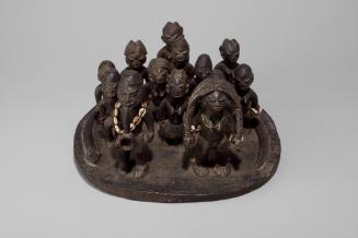 Wedding Procession, 20th Century
Yoruba Culture; Nigeria
Wood, cowrie shell and beads;  6 3/4…