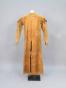 Coat, c. 1905
Guaymas, Mexico
Leather; 19 1/2 × 50 1/2 in.
77.34.1
Gift of Mr. Robert C. No…