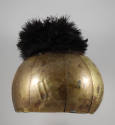 Helmet, 20th Century
Otuho culture; South Sudan
Human hair, clay, brass and ostrich feather; …