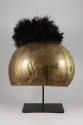 Helmet, 20th Century
Otuho culture; South Sudan
Human hair, clay, brass and ostrich feather; …