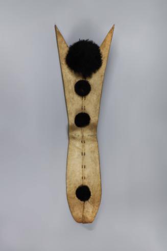 Shield, 20th Century
Otuho culture; South Sudan
Bleached buffalo hide, wood, and ostrich feat…