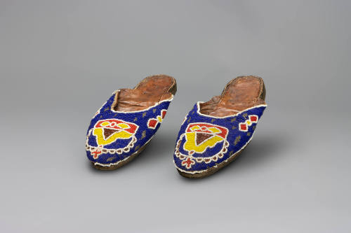 Chief’s Slippers (Bata Ileke), early 20th Century
Yoruba culture; Nigeria
Leather and glass b…