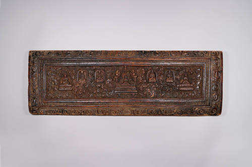 Sutra Cover, 19th Century
Tibet Autonomous Region
Wood; 9 3/8 × 28 × 1 1/4 in.
2021.8.31
Gi…