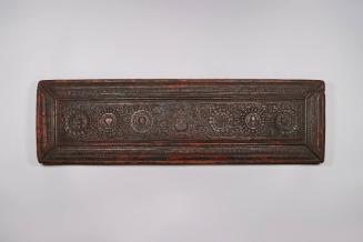 Sutra Cover, 19th Century
Tibet Autonomous Region
Wood; 8 3/4 × 29 3/4 × 1 7/8 in.
2021.8.32…