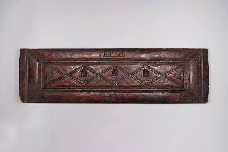 Sutra Cover, 19th Century
Tibet Autonomous Region
Wood; 7 3/4 × 27 1/2 × 1 in.
2021.8.34
Gi…
