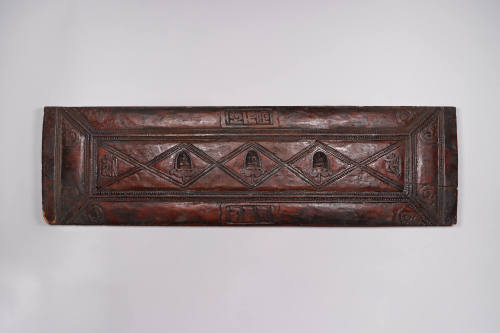Sutra Cover, 19th Century
Tibet Autonomous Region
Wood; 7 3/4 × 27 1/2 × 1 in.
2021.8.34
Gi…