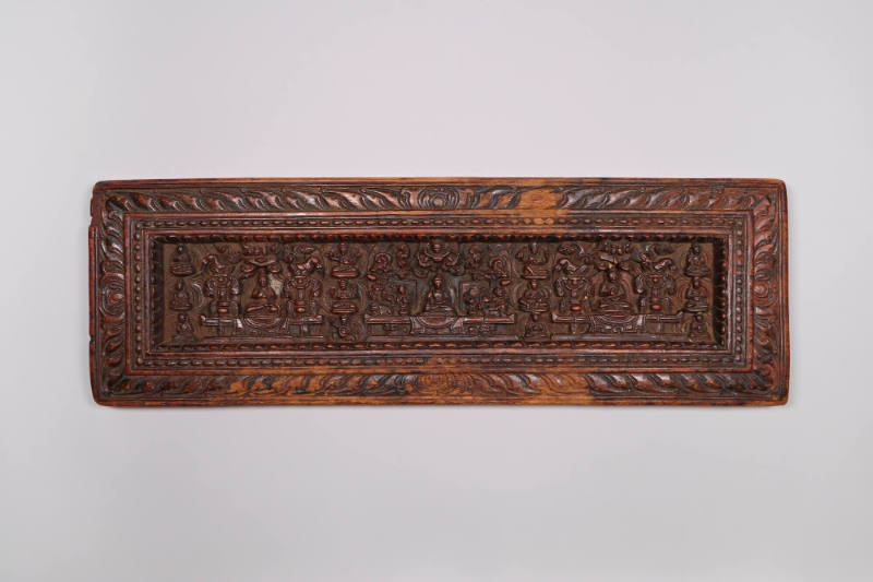 Sutra Cover, 19th Century
Tibet Autonomous Region
Wood; 5 5/8 × 17 1/4 × 1 in.
2021.8.40
Gi…