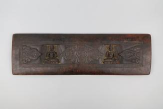 Sutra Cover, 19th Century
Tibet Autonomous Region
Wood; 8 × 26 7/8 × 7/8 in.
2021.8.41
Gift…