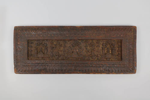 Sutra Cover, 19th Century
Tibet Autonomous Region
Wood; 10 × 25 3/4 × 1 1/4 in.
2021.8.42
G…